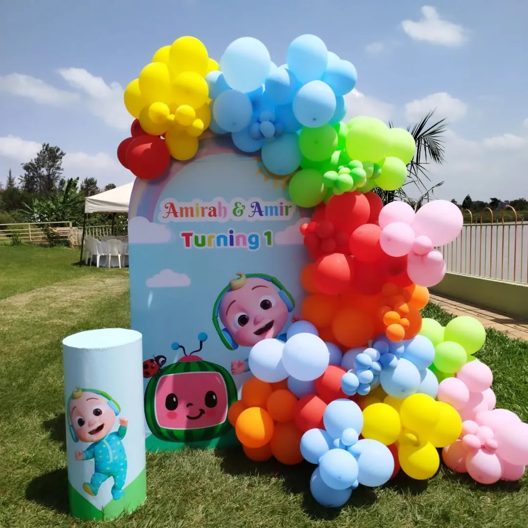 "Custom 1 board wooden panel backdrop with organic multi-tonal balloon garland for birthday party decor in Westlands"